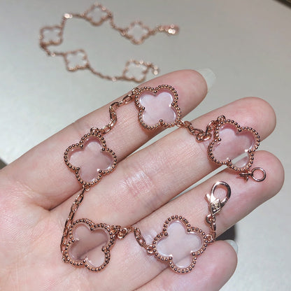 [Angela Jewellery] Armband mit Kleeblatt-Motiv und Bergkristall in Roségold
