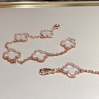 [Angela Jewellery] Armband mit Kleeblatt-Motiv und Bergkristall in Roségold
