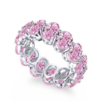 Angela Jewelry]Zierlicher, länglicher Tennisring im Kissenschliff