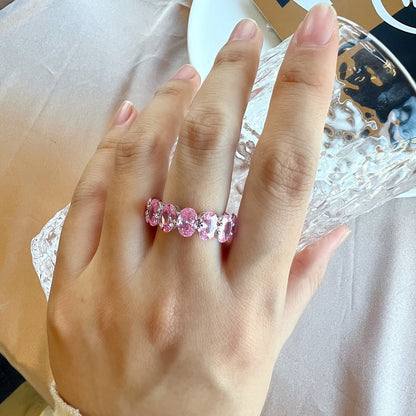 Angela Jewelry]Zierlicher, länglicher Tennisring im Kissenschliff