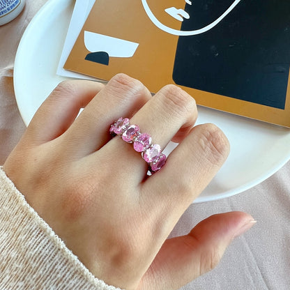 Angela Jewelry]Zierlicher, länglicher Tennisring im Kissenschliff