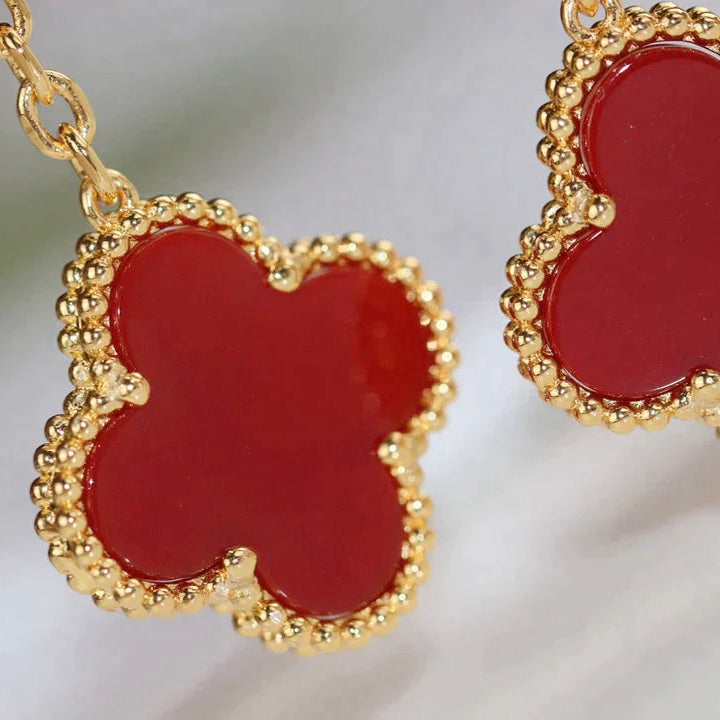 [Angela Schmuck]Ohrringe mit Kleeblatt-Motiv und Tigerauge und Karneol