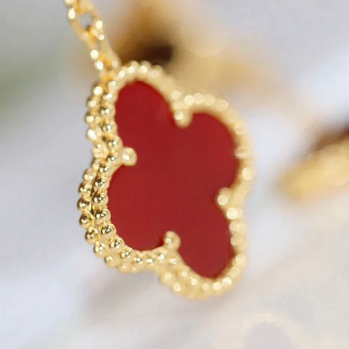 [Angela Schmuck]Ohrringe mit Kleeblatt-Motiv und Tigerauge und Karneol