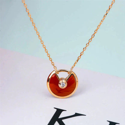 [Angela Schmuck]AMULETT GOLD KARNEOL ONYX HALSKETTE