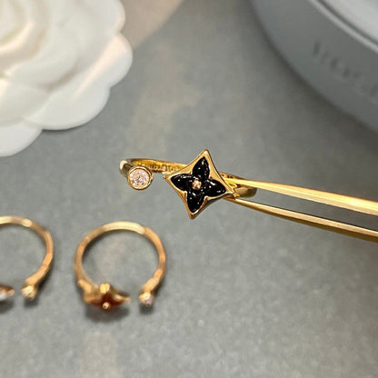 [Angela Jewellery] Offener Ring mit 1 Diamant im Sterndesign