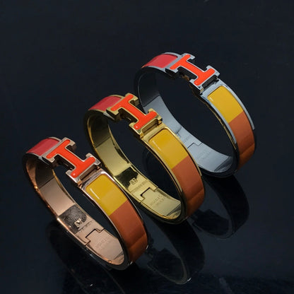 [Angela Jewellery]H-ARMBAND ORANGE REGENBOGEN KERAMIK