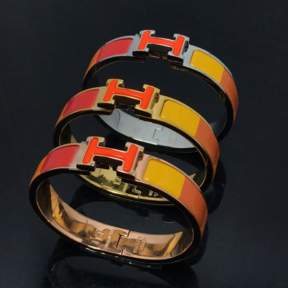 [Angela Jewellery]H-ARMBAND ORANGE REGENBOGEN KERAMIK