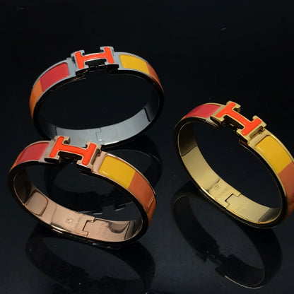 [Angela Jewellery]H-ARMBAND ORANGE REGENBOGEN KERAMIK