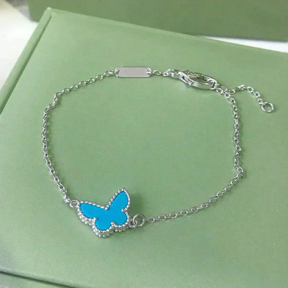 [Angela Schmuck] SCHMETTERLING TÜRKIS SCHMETTERLINGSARMBAND SILBER