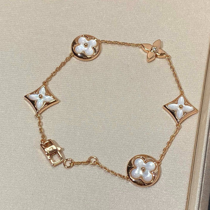 [Angela Jewellery]Armband mit Stern- und Sonnenmotiv, 5 Perlmutt-Rotgold