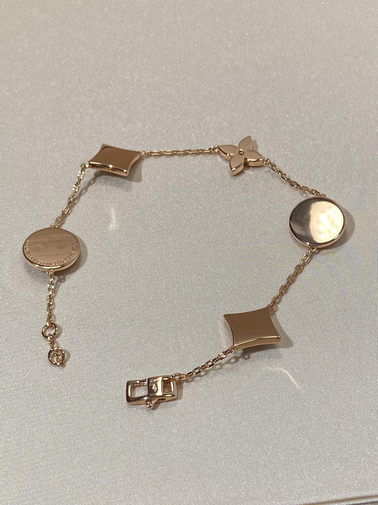 [Angela Jewellery]Armband mit Stern- und Sonnenmotiv, 5 Perlmutt-Rotgold