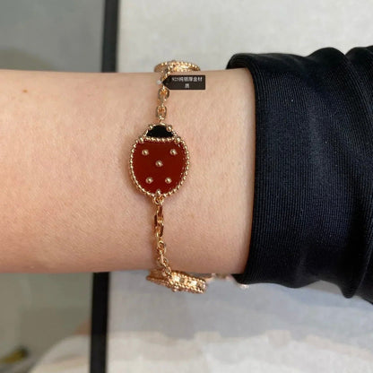 [Angela Schmuck]Armband mit 5 Glücksmotiven