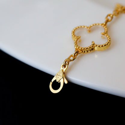 [Angela Jewellery] Armband mit Kleeblatt-Motiv und Bergkristall in Roségold