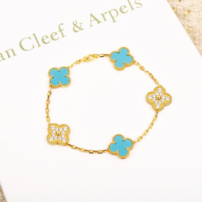 [Angela Jewellery] Armband aus türkisfarbenem Gold mit Kleeblatt-Motiv und Diamanten