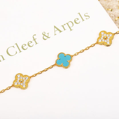 [Angela Jewellery] Armband aus türkisfarbenem Gold mit Kleeblatt-Motiv und Diamanten
