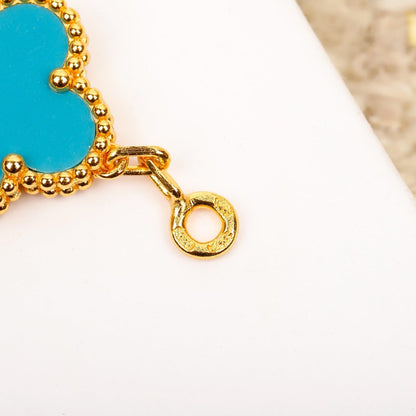 [Angela Jewellery] Armband aus türkisfarbenem Gold mit Kleeblatt-Motiv und Diamanten