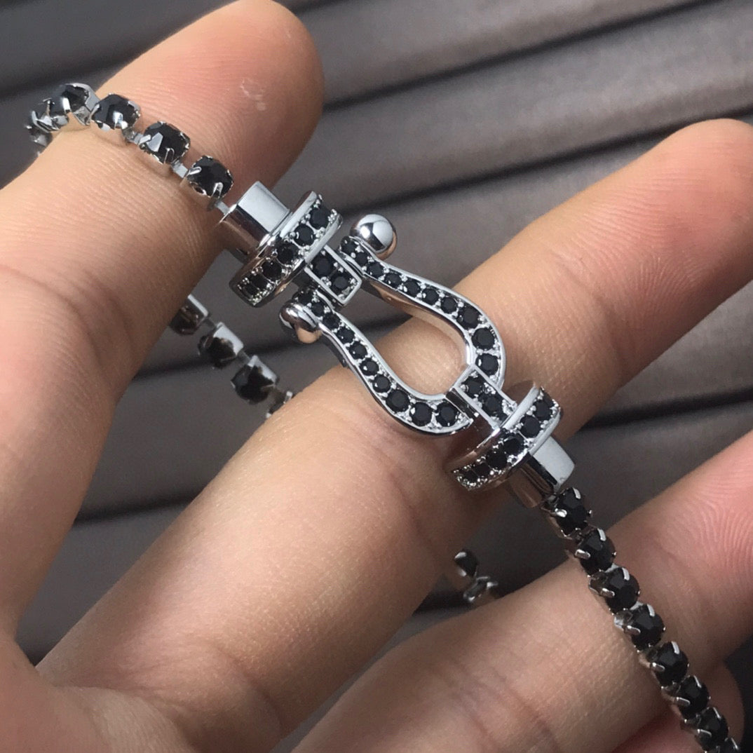 [Angela Jewellery]FORCE GROSSES HUFEISEN-TENNISARMBAND MIT VOLLEN DIAMANTEN 