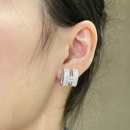 [Angela Jewellery]H Ohrstecker mit silbernen Diamanten